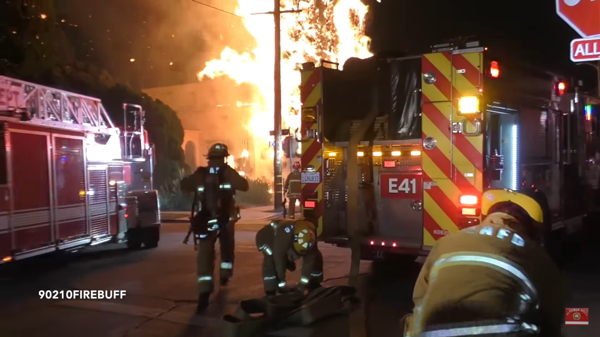 Pre-arrival video: Burning cypress trees set California apartment
building on fire