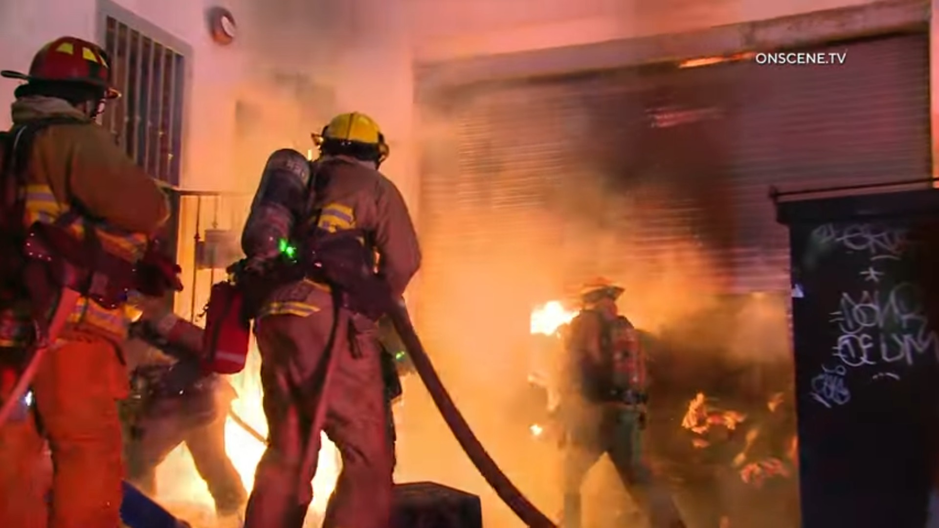 Early video: Trash fire extends to Los Angeles building
