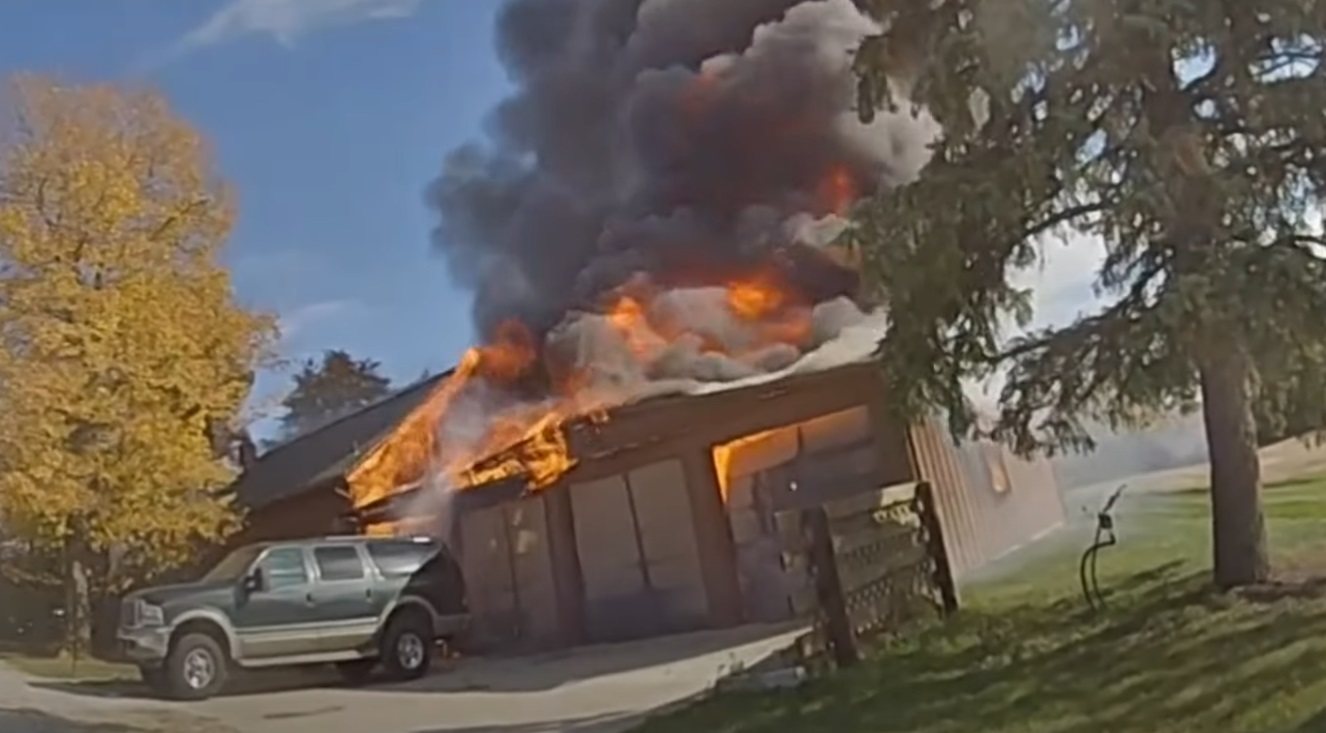 Caught on camera: Woman rescued from basement of burning Ohio home